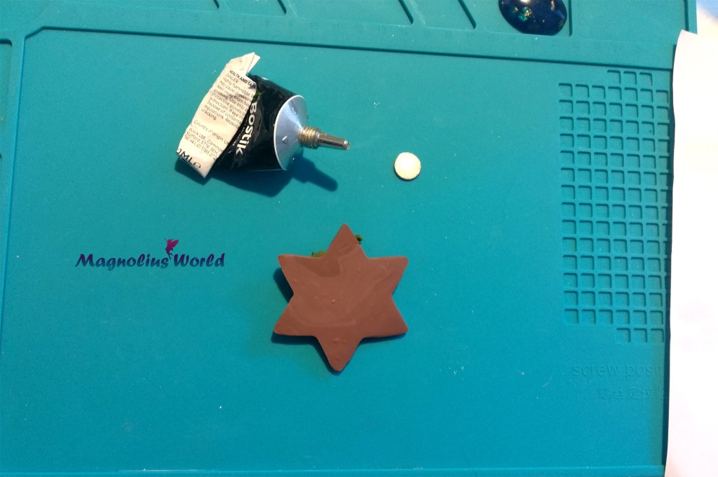 przyklejanie magnesu